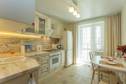 Kitchen, Уютная квартира на Толстого 20 in Ufa Kitchen, Уютная квартира на Толстого 20 in Ufa