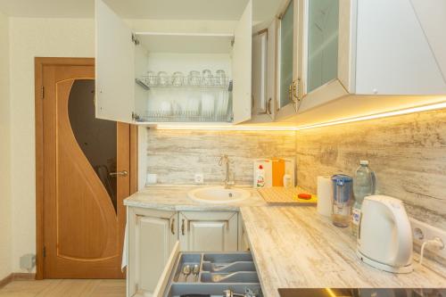 Kitchen, Уютная квартира на Толстого 20 in Ufa Kitchen, Уютная квартира на Толстого 20 in Ufa