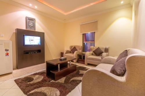 Shared lounge/TV area, مرسال سويت near Diriyah Historical City Shared lounge/TV area, مرسال سويت near Diriyah Historical City