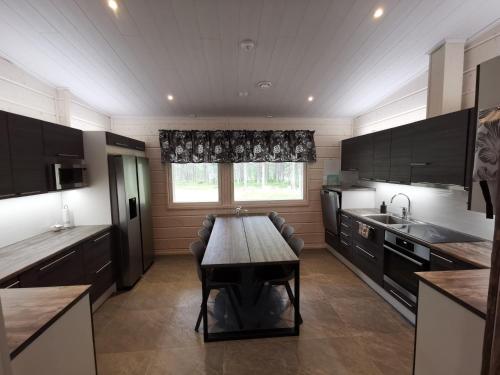 Kitchen, Maglelin Experience Lodge in Akaslompolo Kitchen, Maglelin Experience Lodge in Akaslompolo