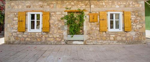 Entrance, Stone Suites at Lefkada's Old Port in Lefkada Entrance, Stone Suites at Lefkada's Old Port in Lefkada