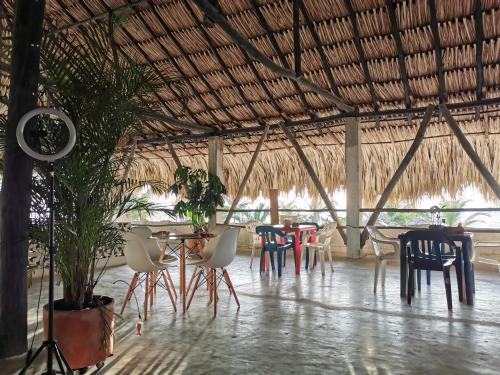 Restaurant, Casa el Muelle in Covenas Dos Restaurant, Casa el Muelle in Covenas Dos