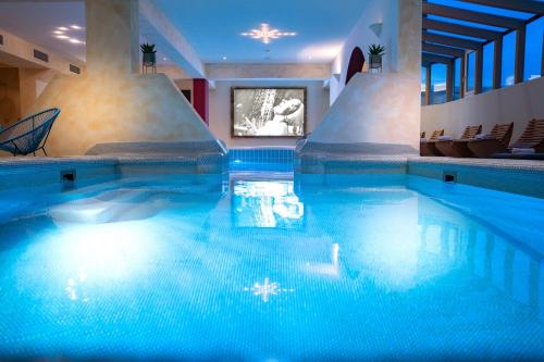 Piscina, Verwöhnhotel Vötters Sportkristall in Kaprun Piscina, Verwöhnhotel Vötters Sportkristall in Kaprun