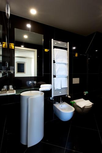 Vannas istaba, Al Campanile Aparthotel & Suite in Baveno Vannas istaba, Al Campanile Aparthotel & Suite in Baveno