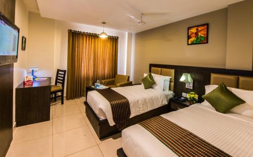 客房, 波匹特利奇廣場酒店 (Plaza Hotels Trichy) in 蒂魯吉拉帕利 客房, 波匹特利奇廣場酒店 (Plaza Hotels Trichy) in 蒂魯吉拉帕利