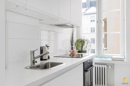 WeHost Studio for 4 with A Soothing Inner Yard Park View in Töölö WeHost Studio for 4 with A Soothing Inner Yard Park View in Töölö