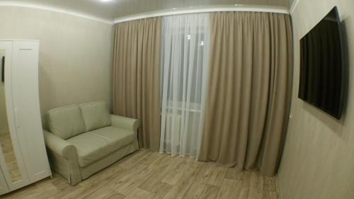 Balcony/terrace, 2-к Апартаменты с отличным расположением in Kogalym Balcony/terrace, 2-к Апартаменты с отличным расположением in Kogalym