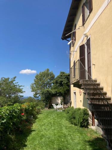 Entrance, ALTIDO Delightful 2BR Apt with Dream Garden in Ponzone in Ponzone Entrance, ALTIDO Delightful 2BR Apt with Dream Garden in Ponzone in Ponzone