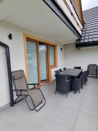 Erkély/terasz, DOMEK Z POMOSTEM nad Jeziorem Czorsztyńskim (DOMEK Z POMOSTEM nad Jeziorem Czorsztynskim) in Frydman Erkély/terasz, DOMEK Z POMOSTEM nad Jeziorem Czorsztyńskim (DOMEK Z POMOSTEM nad Jeziorem Czorsztynskim) in Frydman