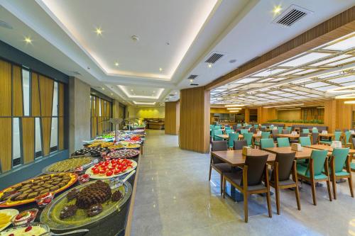 Comida y bebida, Poseidon Hotel - Adult Only in Marmaris Comida y bebida, Poseidon Hotel - Adult Only in Marmaris