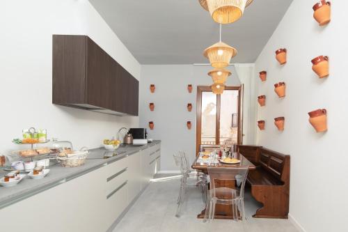 Eten en drinken, Terra del Sasso Suites - Design Architetto Salvatore Spataro in Paestum Eten en drinken, Terra del Sasso Suites - Design Architetto Salvatore Spataro in Paestum