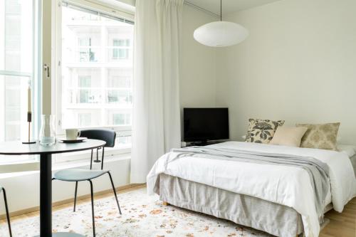 Bed, Brand new stylish studio - Free Parking! in Ruoholahti Bed, Brand new stylish studio - Free Parking! in Ruoholahti