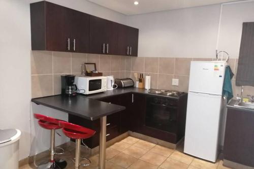 BEAUTIFUL APARTM B10 SITUATED IN BAINS GAME LODGE in บลูมฟอนเทน BEAUTIFUL APARTM B10 SITUATED IN BAINS GAME LODGE in บลูมฟอนเทน