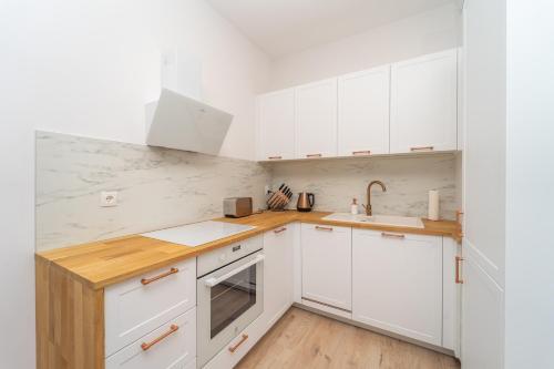 Cozinha, Nadmorski Dwór - Green Apartment (Nadmorski Dwor - Green Apartment) in Brzezno Cozinha, Nadmorski Dwór - Green Apartment (Nadmorski Dwor - Green Apartment) in Brzezno