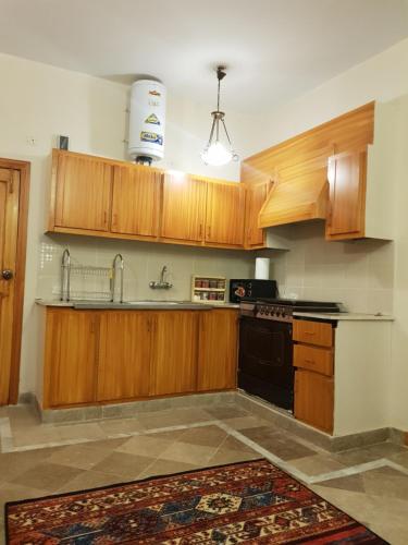 Kitchen, Entire Apartment 2bed Condo at Burban Oakwood in Bhurban Kitchen, Entire Apartment 2bed Condo at Burban Oakwood in Bhurban