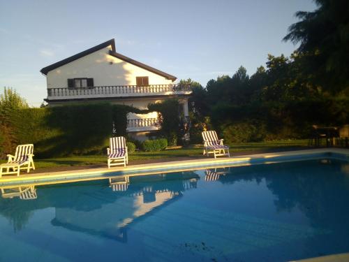 สระว่ายน้ำ, Pinheirinhos - Quinta de São Caetano (Pinheirinhos - Quinta de Sao Caetano) in คาราปิโต สระว่ายน้ำ, Pinheirinhos - Quinta de São Caetano (Pinheirinhos - Quinta de Sao Caetano) in คาราปิโต
