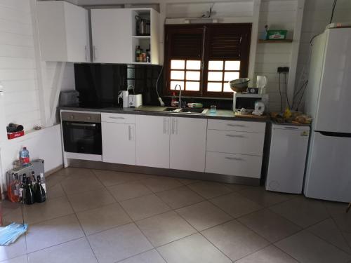 Charmant T3 climatisé Piscine privée (Charmant T3 climatise Piscine privee) in Le Diamant Charmant T3 climatisé Piscine privée (Charmant T3 climatise Piscine privee) in Le Diamant