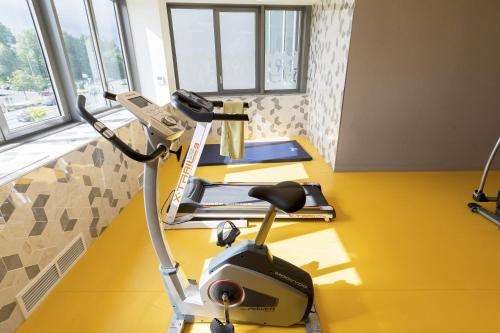 Fitness center, Appart-Hotel Mer & Golf City Bordeaux Lac in Le Lac Fitness center, Appart-Hotel Mer & Golf City Bordeaux Lac in Le Lac