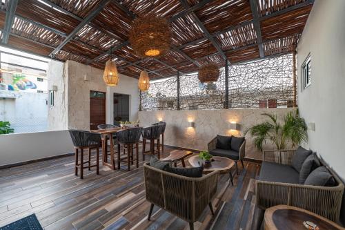 Shared lounge/TV area, Casa del Arbol in Tulum Shared lounge/TV area, Casa del Arbol in Tulum