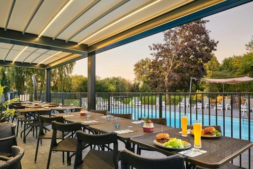 Ресторан, Novotel Roissy Saint Witz in Сан-Вітц Ресторан, Novotel Roissy Saint Witz in Сан-Вітц