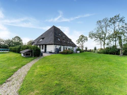 Vista exterior, Spacious and sustainable farmhouse in Heiloo with large garden in Heiloo Vista exterior, Spacious and sustainable farmhouse in Heiloo with large garden in Heiloo