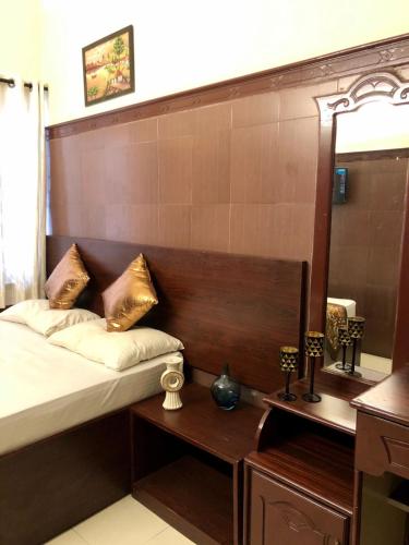 Bed, New AS Tourist Home Aluva in Aluva Bed, New AS Tourist Home Aluva in Aluva
