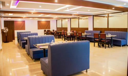Restaurant, The Nisarga Grand sidedahalli main road in Peeniya Restaurant, The Nisarga Grand sidedahalli main road in Peeniya