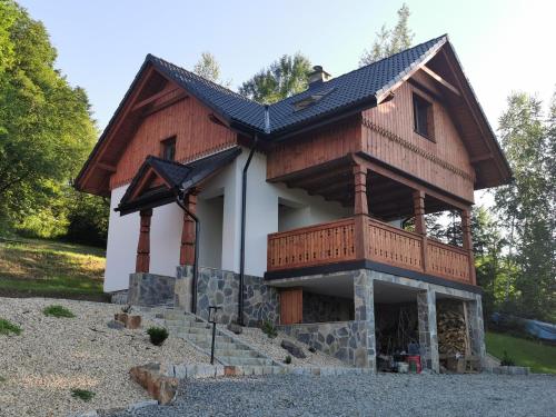 A szálláshely kívülről, DOMEK POD CZEREMCHĄ (DOMEK POD CZEREMCHA) in Zawóz A szálláshely kívülről, DOMEK POD CZEREMCHĄ (DOMEK POD CZEREMCHA) in Zawóz