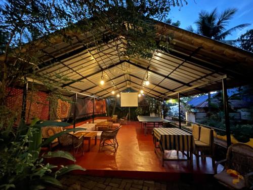 共用ラウンジ/TVエリア, Hope Hostels, Varkala - Helipad in バルカラ 共用ラウンジ/TVエリア, Hope Hostels, Varkala - Helipad in バルカラ