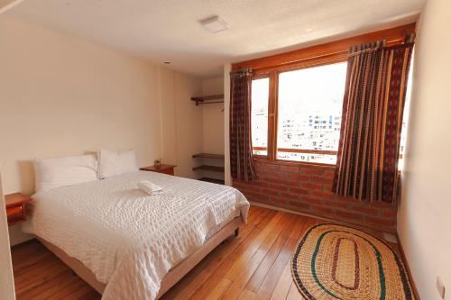 Habitación, Los Ponchos Inn Apartotel in Otavalo Habitación, Los Ponchos Inn Apartotel in Otavalo