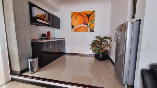 Kitchen, Habitat Suites Hotel in Pereira Kitchen, Habitat Suites Hotel in Pereira