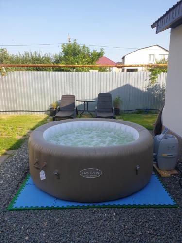 Hot tub, Zvezda Village in Pristannoye Hot tub, Zvezda Village in Pristannoye