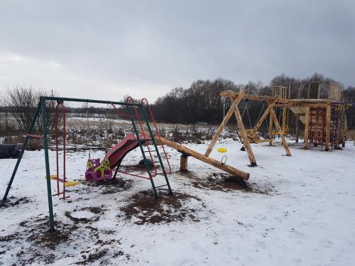 Большои дом с верандои с зонои барбекю и детскои площадкои in Privolzhsk Большои дом с верандои с зонои барбекю и детскои площадкои in Privolzhsk