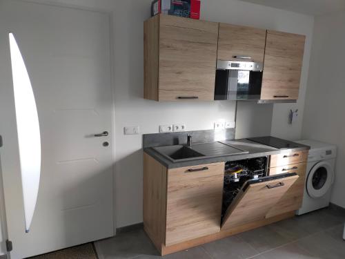 Kitchen, Maison individuelle neuve plein pied avec terrasse et jardin clos 10minutes a pied de la plage in Quiberville Kitchen, Maison individuelle neuve plein pied avec terrasse et jardin clos 10minutes a pied de la plage in Quiberville