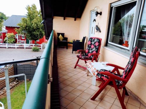 Erkély/terasz, Haus Heidrun in Dolgesheim Erkély/terasz, Haus Heidrun in Dolgesheim