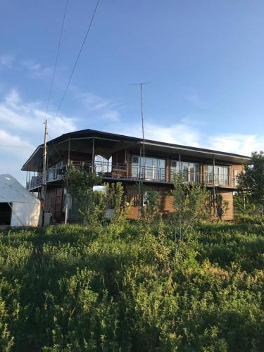 Guest house and yurt camp "Aktan" in Bökönbayevo Guest house and yurt camp "Aktan" in Bökönbayevo