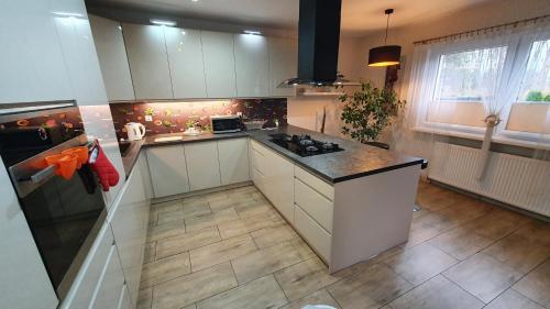 Konyha, Dom Na Skarpie - Ucieczka Na Wieś - Samodzielne wejście na szyfr, 100m2 (Dom Na Skarpie - Ucieczka Na Wies - Samodzielne wejscie na szyfr, 100m2) in Kalisz Konyha, Dom Na Skarpie - Ucieczka Na Wieś - Samodzielne wejście na szyfr, 100m2 (Dom Na Skarpie - Ucieczka Na Wies - Samodzielne wejscie na szyfr, 100m2) in Kalisz