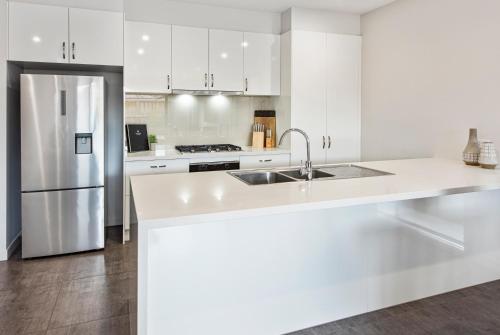 Kitchen, Fawkner Executive Suites & Serviced Apartments in Fawkner Kitchen, Fawkner Executive Suites & Serviced Apartments in Fawkner