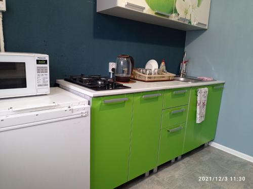 Kitchen, Квартира с однои спальнеи у главного парка Омска. in Oktyabrsky Kitchen, Квартира с однои спальнеи у главного парка Омска. in Oktyabrsky