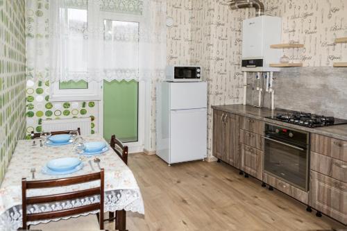 Køkken, MB Apartments Центр Гурьевска Двушка in Gur'yevsk Køkken, MB Apartments Центр Гурьевска Двушка in Gur'yevsk