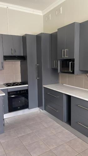 Kitchen, Ikhwezi guest house in Southernwood Kitchen, Ikhwezi guest house in Southernwood