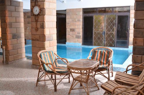 Piscina, ASWAN NILE PALACE (swimming pool-rooftop-Nile view) in Aswan Piscina, ASWAN NILE PALACE (swimming pool-rooftop-Nile view) in Aswan