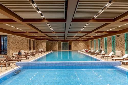 Плувен басейн, Wyndham Garden Burabay in Burabay Плувен басейн, Wyndham Garden Burabay in Burabay