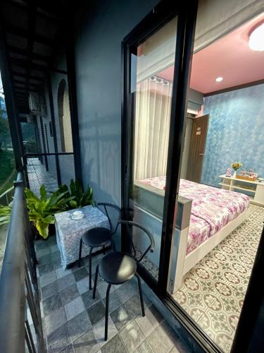 Terraza/balcón, คูร์โดวเเอนด์เเซนด์วิลล่า in Lan Saka Terraza/balcón, คูร์โดวเเอนด์เเซนด์วิลล่า in Lan Saka