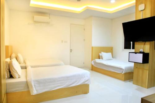 Guestroom, Arawa Traveller's Inn Motel in Sultah Hassanudin International Airport Guestroom, Arawa Traveller's Inn Motel in Sultah Hassanudin International Airport
