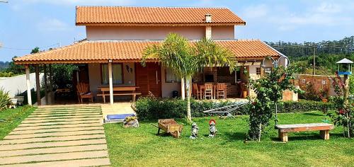 Balcony/terrace, #Resorthousesp Casa de campo com ar, wifi e piscina climatizada em um dos maiores Resort de lazer do in Aguas de Santa Barbara (Sao Paulo) Balcony/terrace, #Resorthousesp Casa de campo com ar, wifi e piscina climatizada em um dos maiores Resort de lazer do in Aguas de Santa Barbara (Sao Paulo)