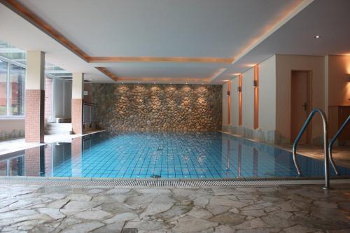 Úszómedence, Hotel Heide Kropke in Essel Úszómedence, Hotel Heide Kropke in Essel