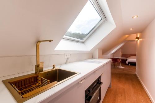 Kitchen, Studios Le Medicis vue Seine in Saint-Etienne-du-Rouvray Kitchen, Studios Le Medicis vue Seine in Saint-Etienne-du-Rouvray