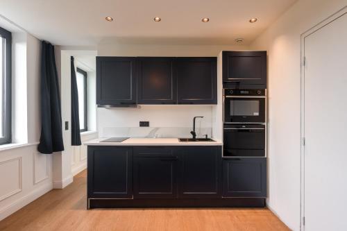Kitchen, Studios Le Medicis vue Seine in Saint-Etienne-du-Rouvray Kitchen, Studios Le Medicis vue Seine in Saint-Etienne-du-Rouvray