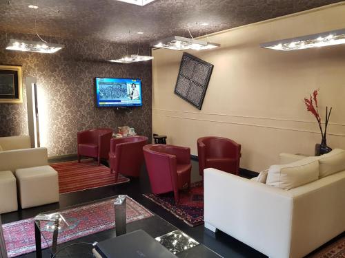 Shared lounge/TV area, Hotel Lancaster in Turin Shared lounge/TV area, Hotel Lancaster in Turin